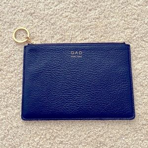 Oad New York navy clutch bag